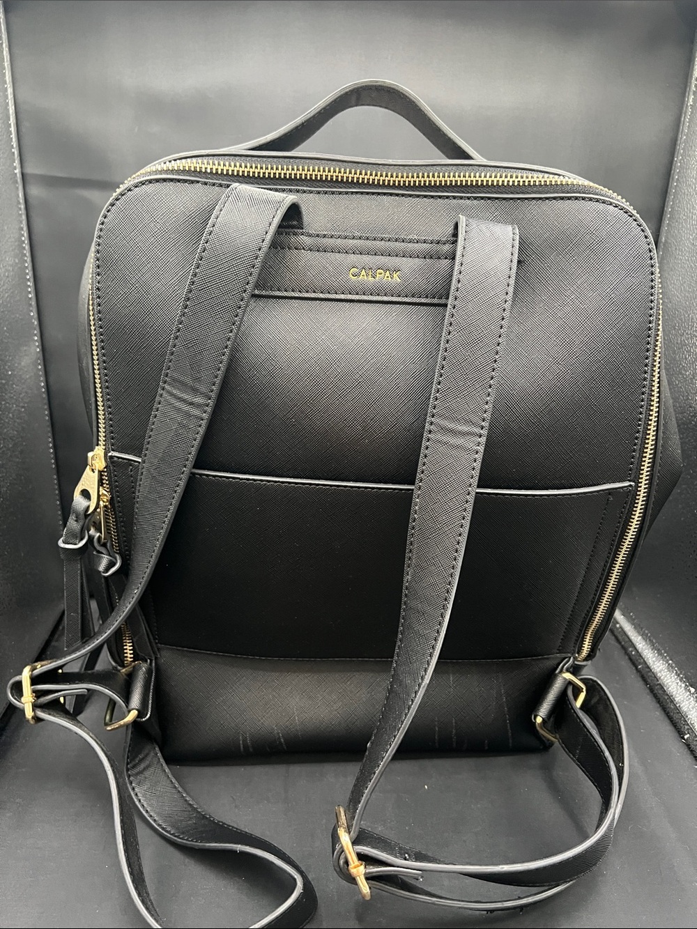Calpak Black Faux Leather Backpack with Gold Hardware